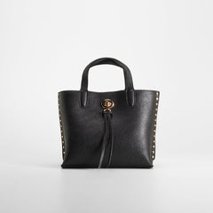 Bolso negro asas tachas doradas PICCOLA PIU