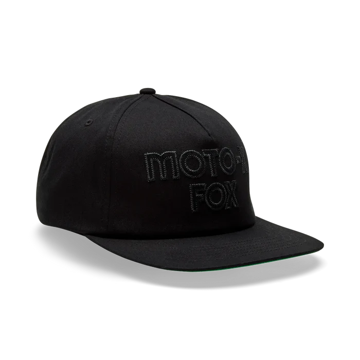 Black Moto-1 Fox cap with green brim, watersports gear for Whitstable surfers