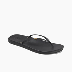Black OluKai flip flop with gold logo, watersports beachwear for Whitstable Kent