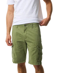 Rip Curl Classic Surf mid green cargo shorts with side pockets, worn by a male model