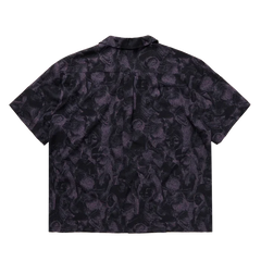 Purple patterned surf shirt with short sleeves and collar, ideal for watersports
